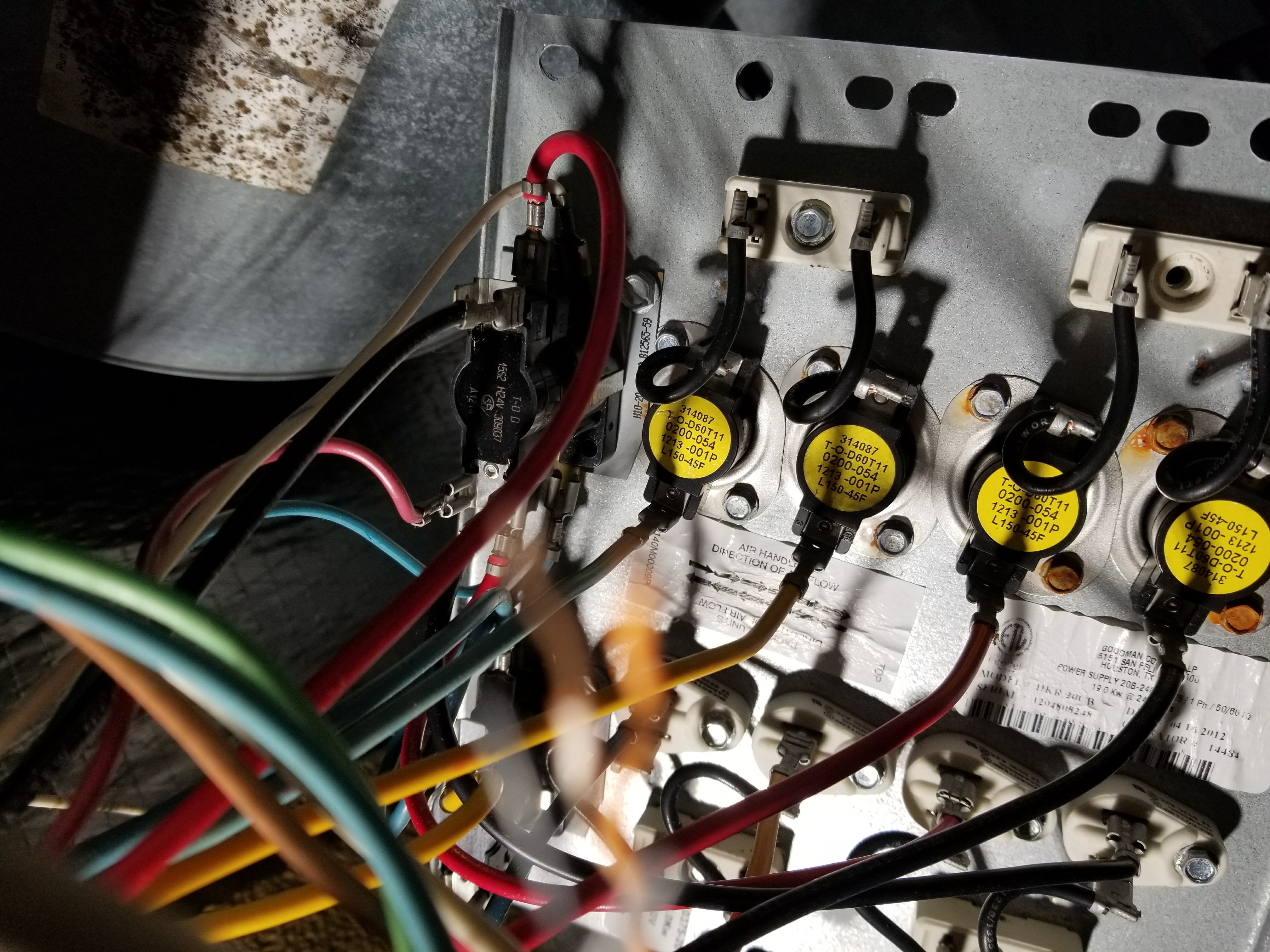 Electrical wires sparking and arcing, showing a dangerous short circuit